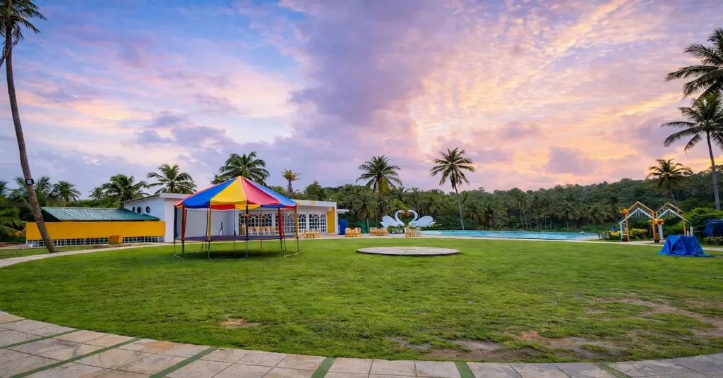 Beautiful green lawn and open garden area at Yellow Garden Port Blair during sunset